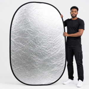 Godox 2-in-1 150 × 200cm silver photography reflector held by a man against a plain white background
